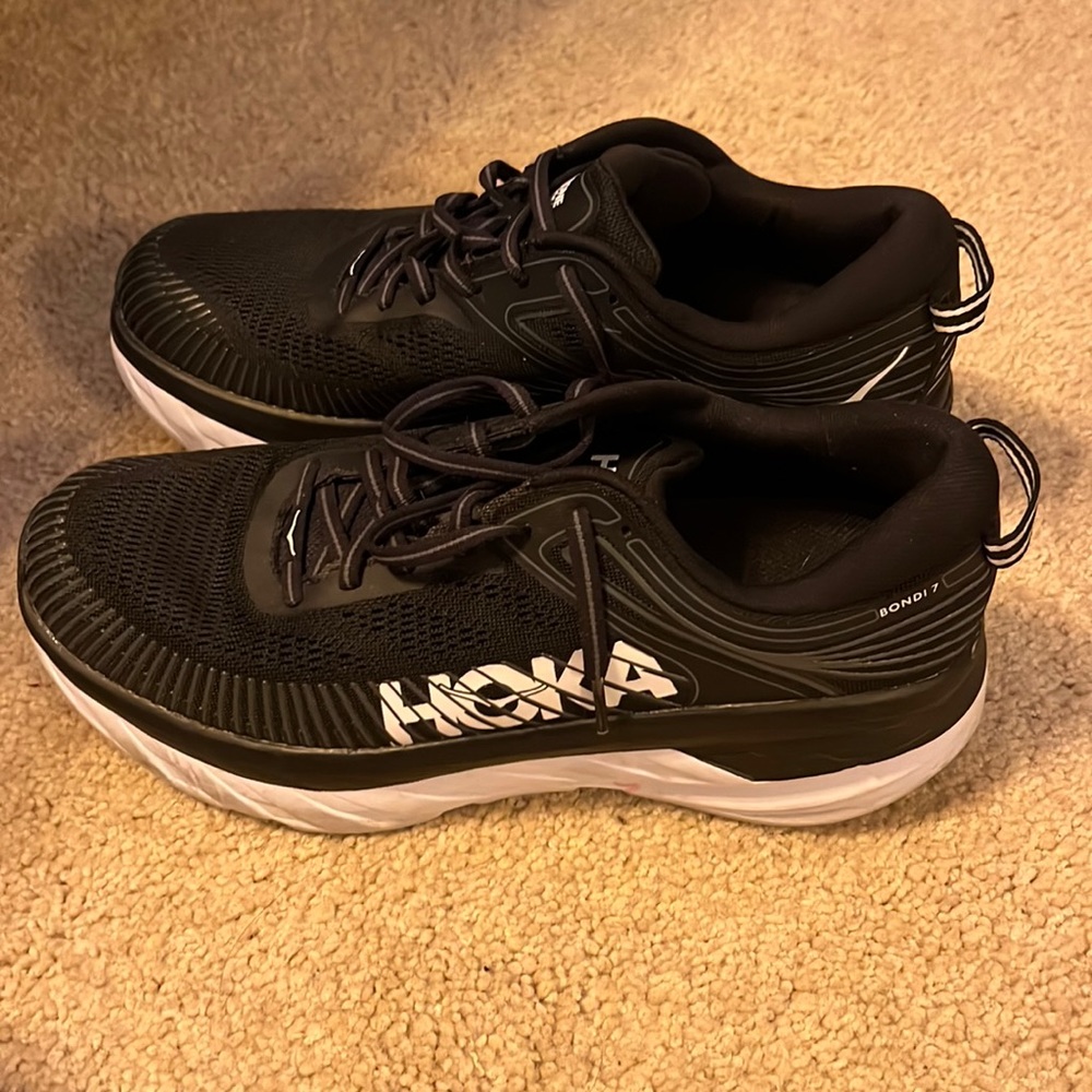 Hoka black and white shoes